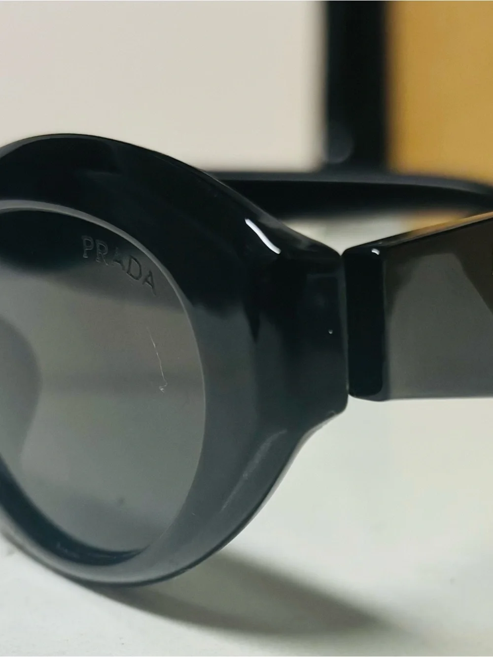 Prada Black Oval Women's Sunglasses